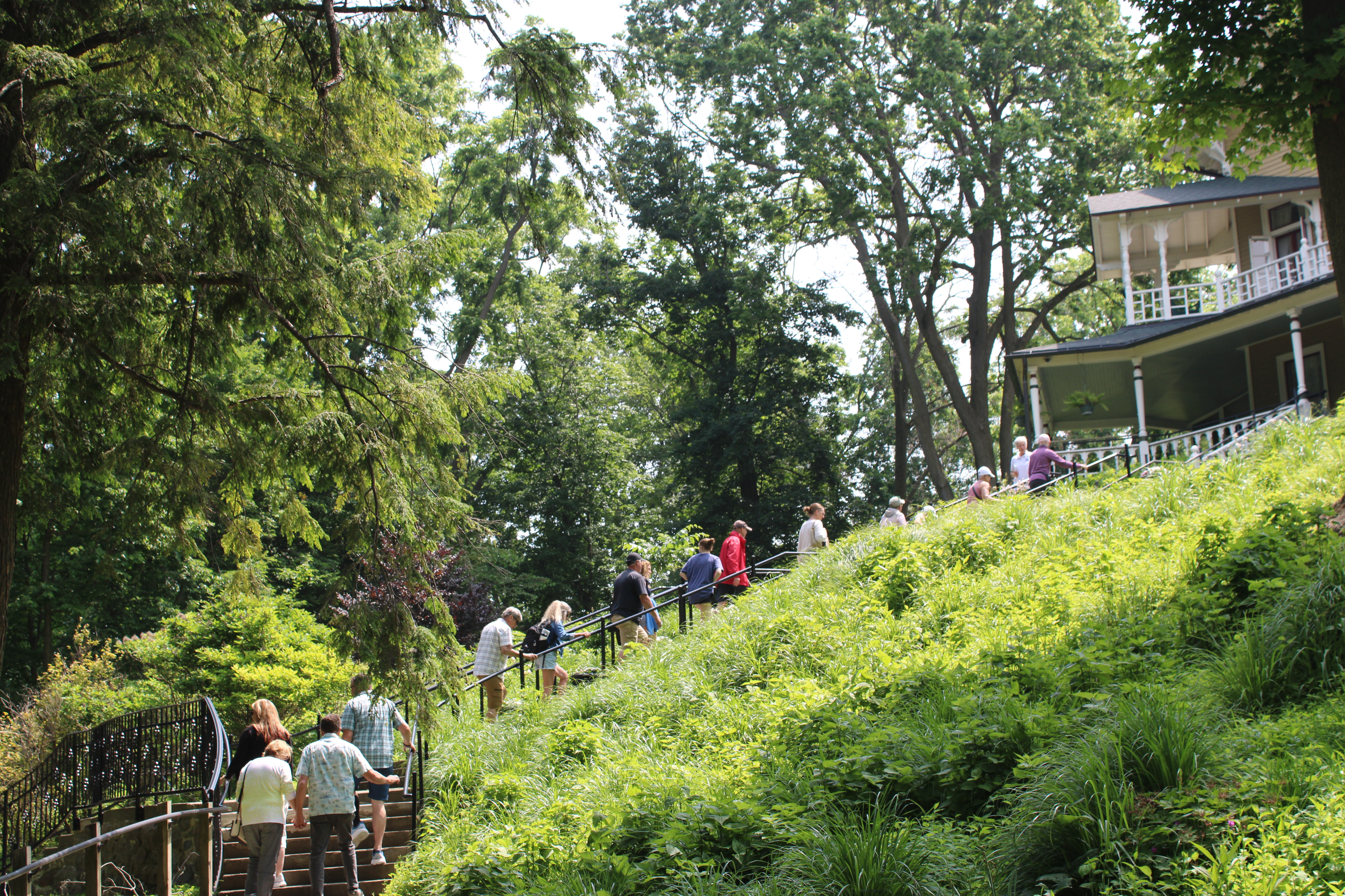 People walking to Black Point Estate